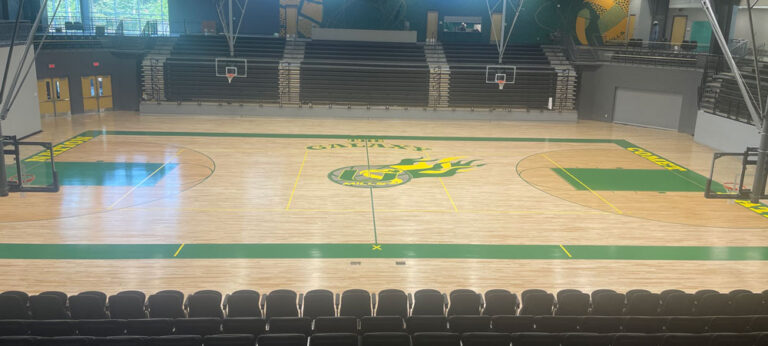 Wilbur D. Mills University Studies High School Basketball court refurbish